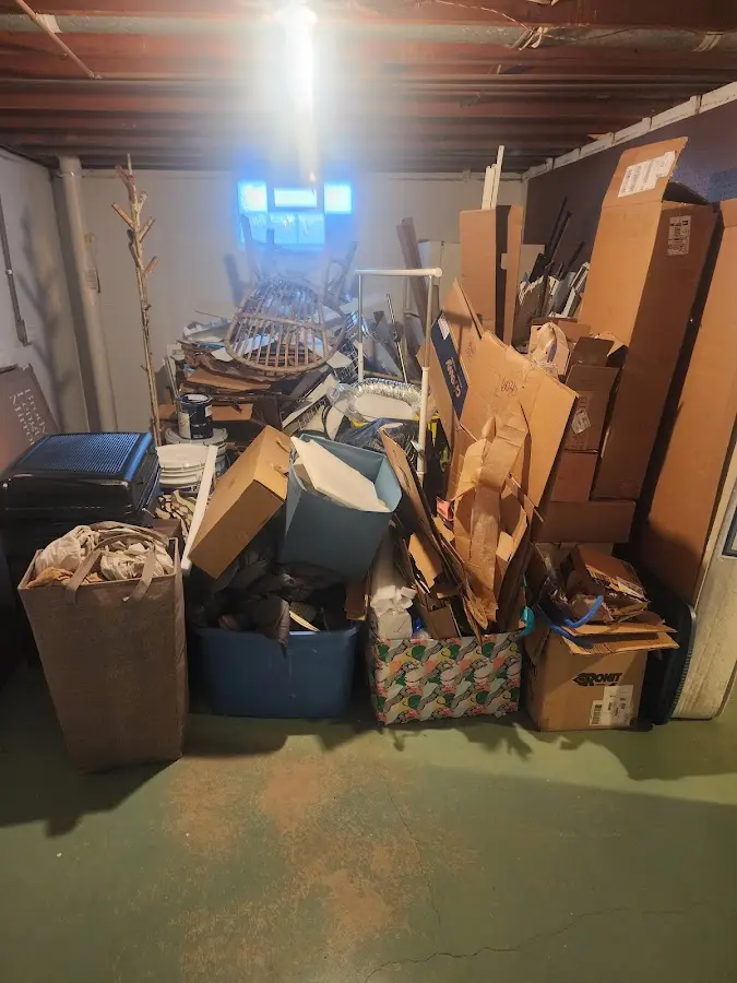 Roll-off dumpster container at job site for 2 Yard Dumpster Rental in North Caldwell